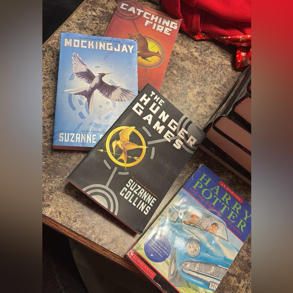 Hunger games book set and additional Harry Potter book